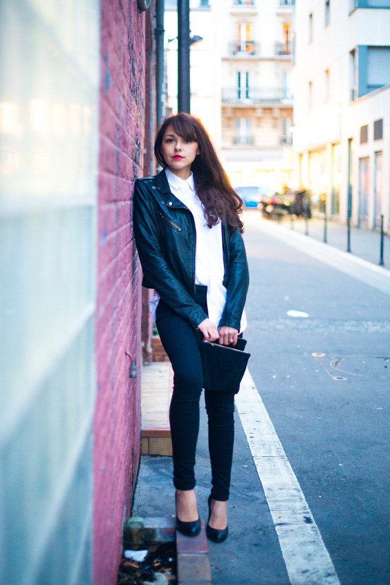 French fashion blog blogger lifestyle Dollyjessy. Rock style outfit on the street, leather perfecto, veste en cuir, jean skinny noir primark, esparpins noirs, pochette en daim Asos, chemise boyfriend blanche Asos, long curly hairs